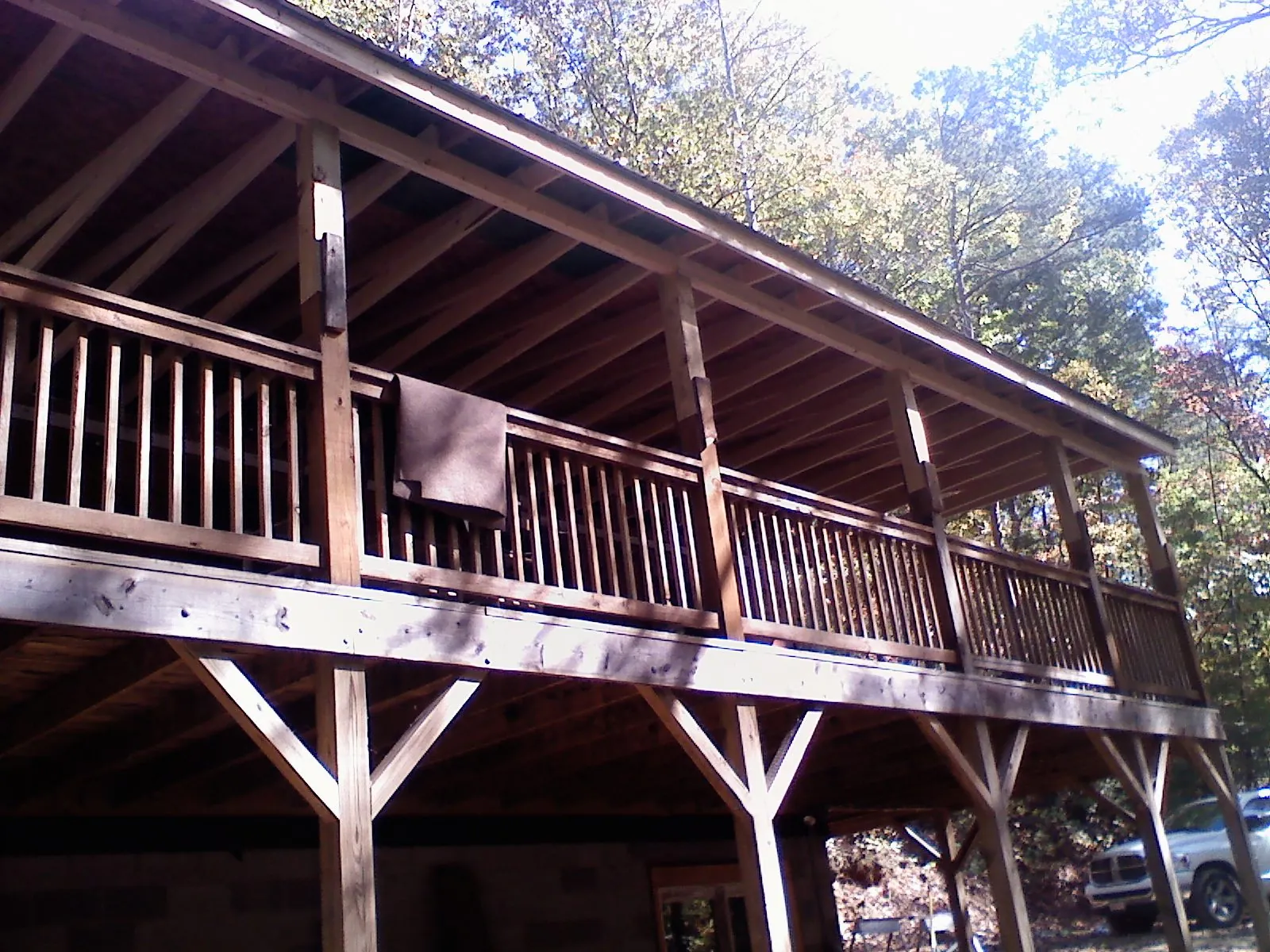 Timber framing under a new elevated porch and deck — Roof Leak Repair in Evensville by Roofing Brothers